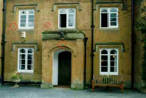Three visible musket holes in the facade